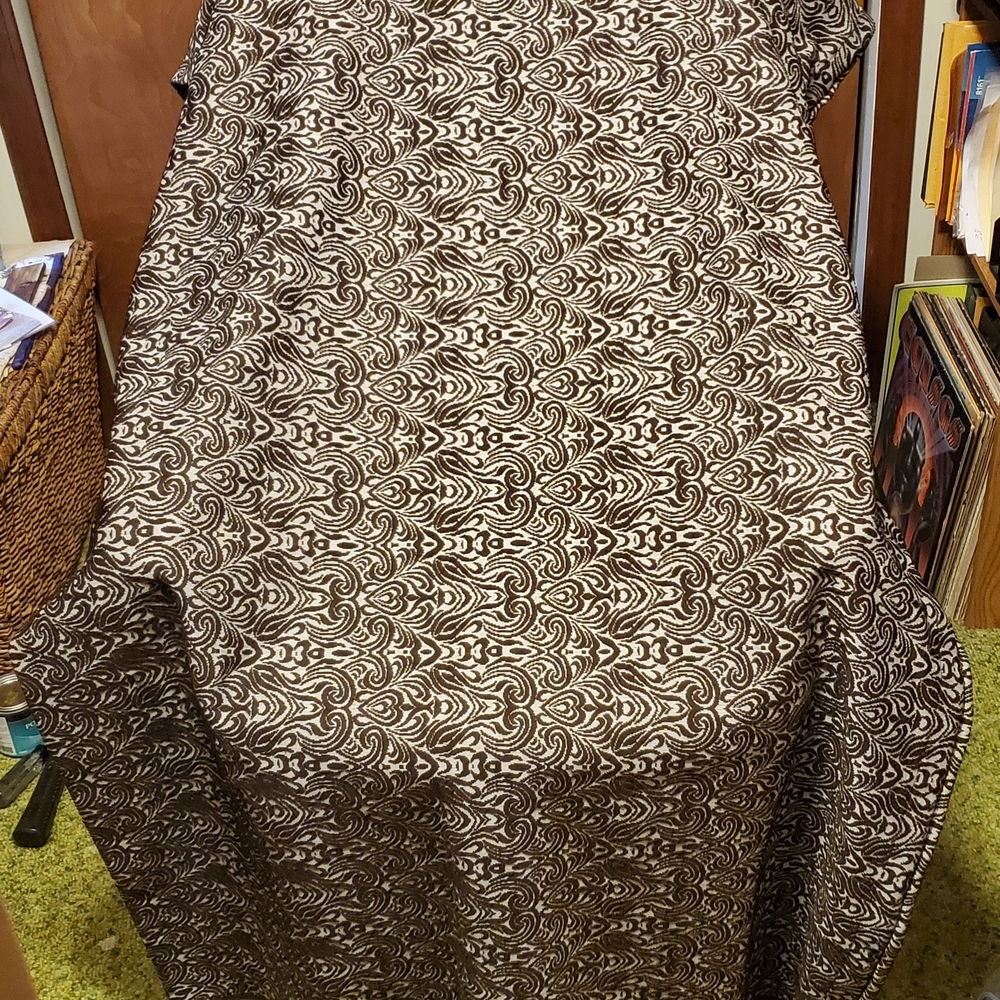 Elegant Brown And Cream Patterned Fabic